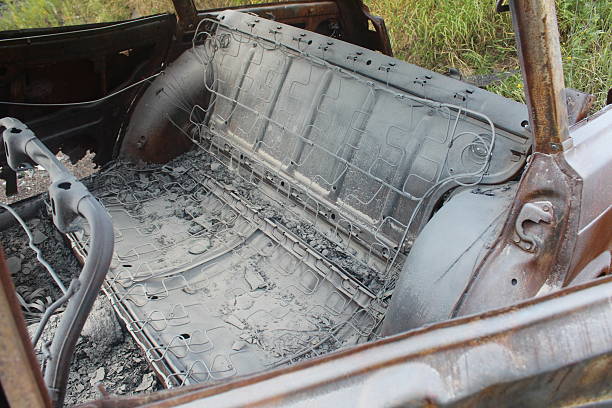 Kilburn SA, Australia - November 10, 2022: Australian Ford Falcon burnt at the car park in front of a shopping centre in Kilburn. South Australia