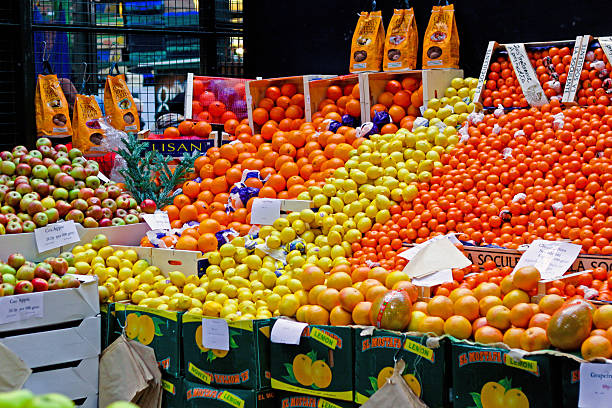 London, United Kingdom - December 18, 2009: Big Bunch of Fresh Citrus Fruits for Sale at Borough Market Winter Season.