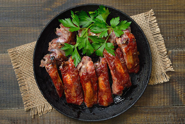 istock Roasted pork ribs on plate 2243192734