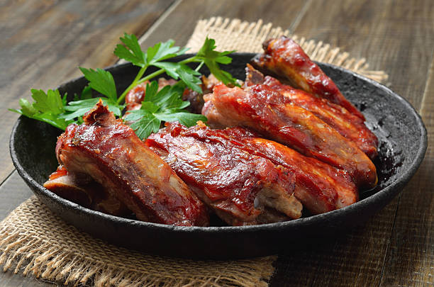 istock Roasted pork ribs on plate 2243192743