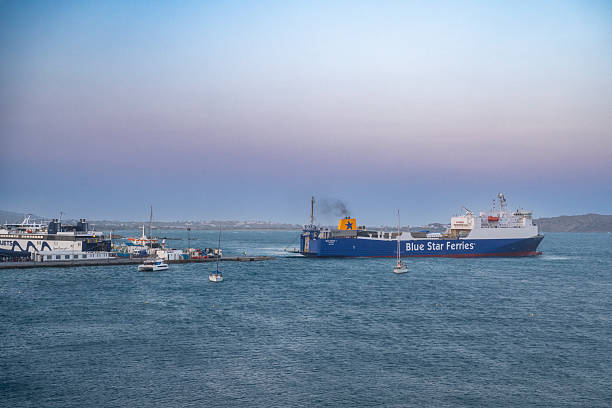 8 August 2025 Naxos, Greece. Seajets and Blue Star Ferries anchored at the port in Naxos, Greece, surrounded by sailboats and gentle morning light over the blue Aegean waters.