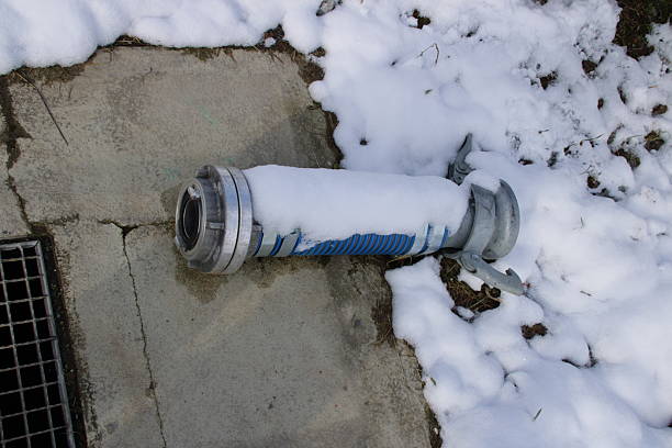 The hose coupling is covered with snow in winter.