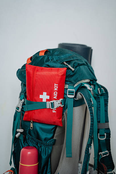 istock This is a sturdy and durable backpack that is designed with a wellequipped first aid kit securely attached to it, ensuring easy access during outdoor activities or everyday adventures 2243217303
