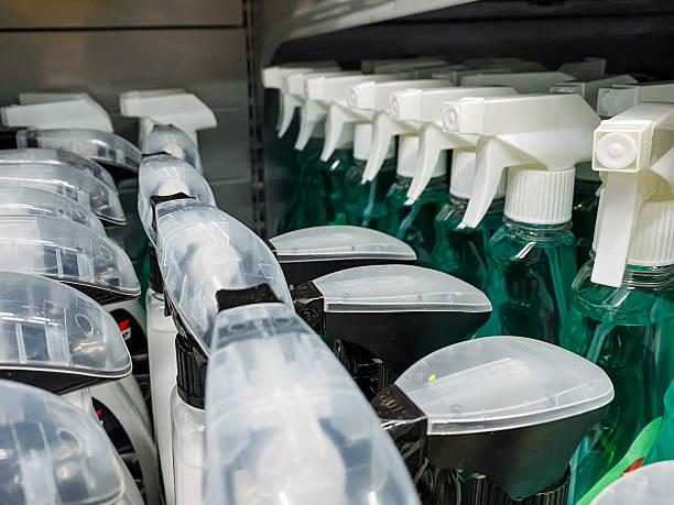 istock A visually appealing row of diverse spray bottles is neatly displayed on a store shelf, showcasing various types, colors, and unique designs for shoppers to easily view and select from 2243217337