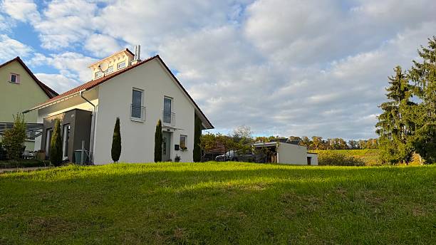 Winzerhausen, Germany - October 18, 2025: Single family house on a meadow