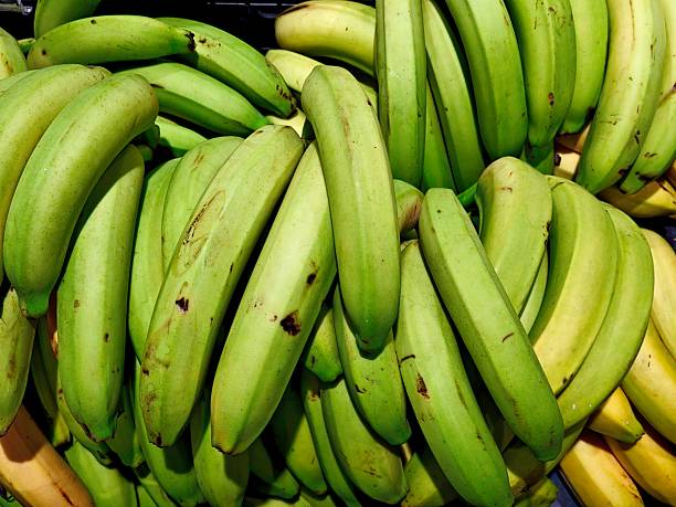 Green bananas in the supermarket. Canary Islands.