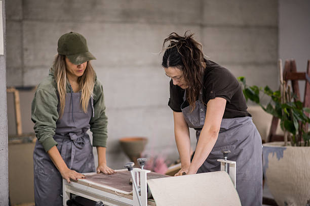 istock Female Pottery Artists Creating Together 2243221906