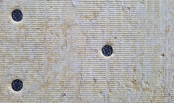 A detail of wall pressed thermal insulation materials,  and attached with dowels