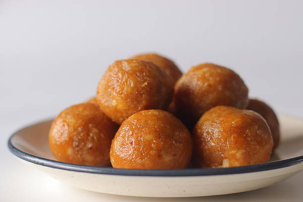 istock Jackfruit laddus on a white backdrop, made with pureed jackfruit, raw sugar and coconut 2243226276