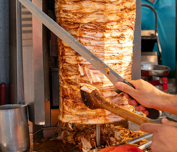 istock Chicken doner kebab preparation cutting 2243233719