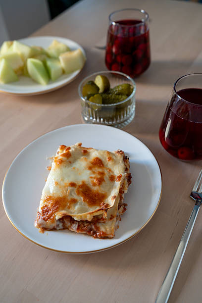 Portion of lasagne on white plate