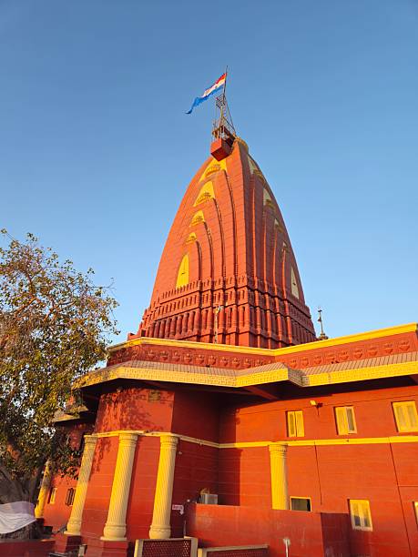 istock Red and Gold Temple Against Blue Sky 2243236644