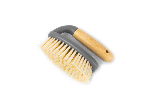 istock Bamboo cleaning brush isolated on white background. Eco-friendly cleaning products on white background. Cleaner concept. Cleaning supplies. Plastic-free items. Cleaning brush with wooden handle 2243241931