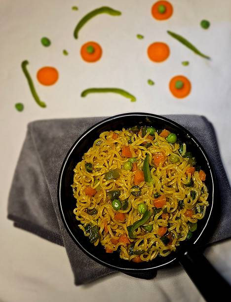 istock A creative top-down flat lay shot of cooked instant noodles 2243241976