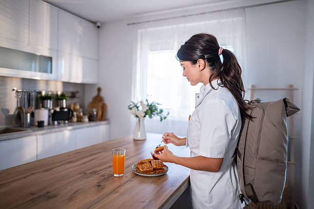 istock Healthcare worker eating breakfast preparing for morning shift 2243256510