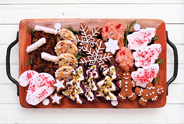 istock Christmas dessert tray. Top view on a white wood background. 2243256961