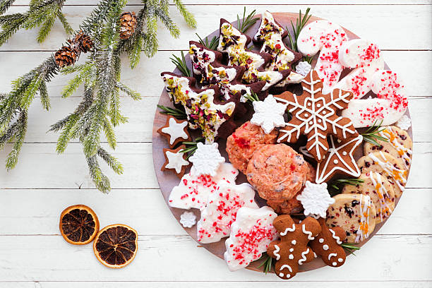 istock Christmas cookie platter. Top view table scene on a white wood background. 2243257100