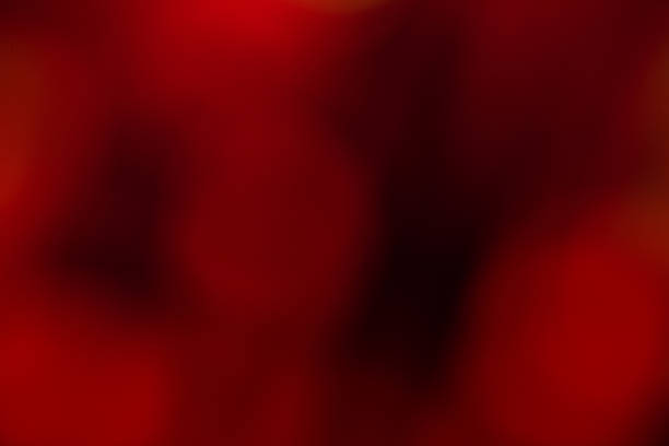 Abstract bokeh lights with red background