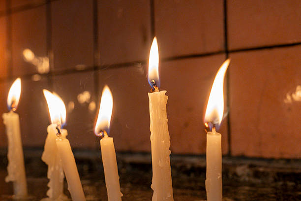 istock Candels in a church 2243262964