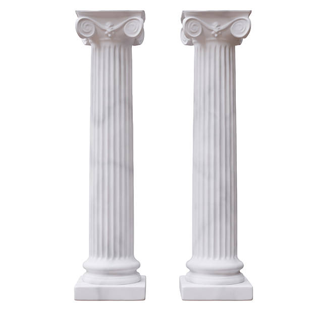 istock Two classic pillars, ancient Greek columns isolated on white, Marble pedestals 2243265116
