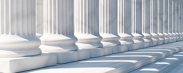 istock Classical columns and stairs, marble pillars row, stone colonnade building facade detail, 2243265130