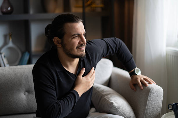 istock Heart attack, man with chest pain suffering at home 2243273366