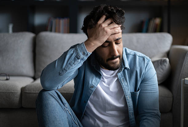 istock Pensive lost in thoughts suffering from depression 2243274326