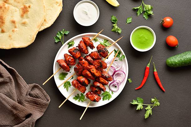 istock Spiced chicken tikka kabab, top view 2243276106