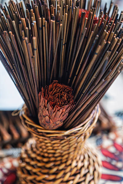 decorative arrangement of natural materials, consistent with elements often used in African inspired table decor
