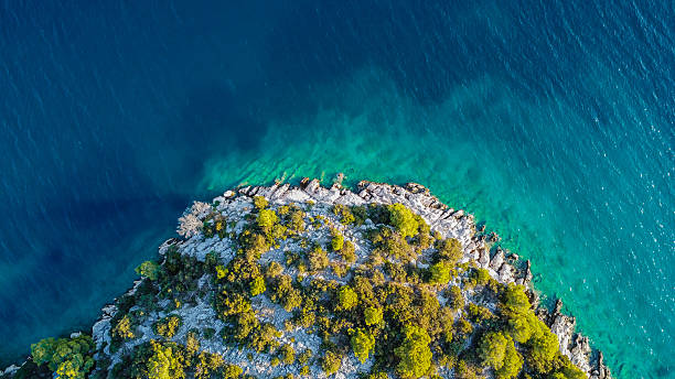 istock Drone capture of coastline with turquoise sea 2243287706