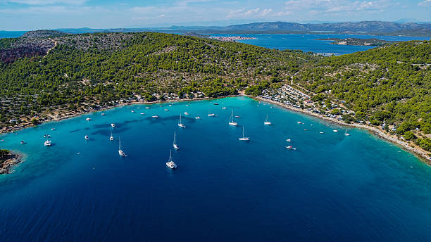 istock Blue sea and rocky coastline seen from above 2243287836