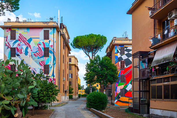 View of the Museo Condominiale di Tor Marancia in Rome, Italy, with large murals on residential buildings.