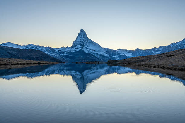 istock Matterhorn Mountain and Reflection in Lake Stellisee. Switzerland 2243292019