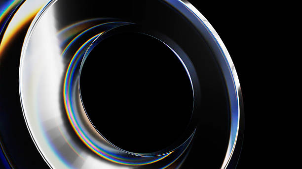 istock Abstract chrome metallic ring rotating with iridescent colors on black background 2243292176