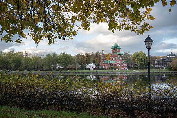 Moscow, Russia - October 17, 2025: City life in autumn days, view of the Church of the Trinity  Life-Giving in Ostankino