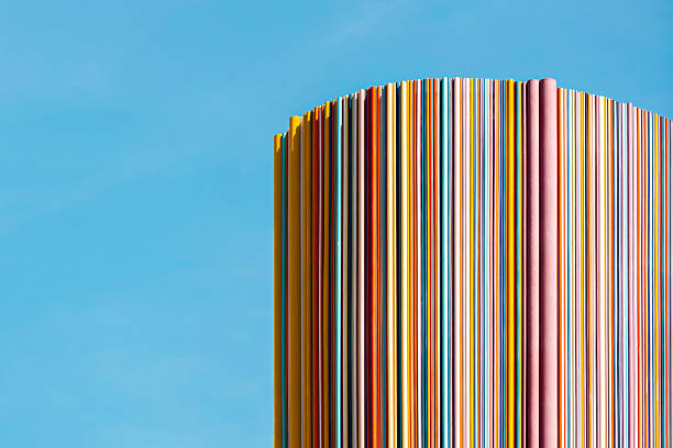 Le Moretti at La Defense Paris is not a building, but a huge 32-meter ventilation pipe lined with 6 hundred fiberglass pipes of 19 bright colors. The weight of the structure is 27 tons. It was finished in 1995.
