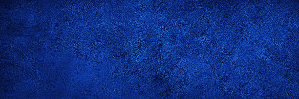 istock Black dark blue cobalt texture background. Painted concrete wall surface. Grunge rough uneven plaster scratched damaged. Close-up. Empty blank template design. 2243307632