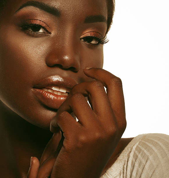 istock Portrait of Young African model with a beautiful makeup in studio 2243309223