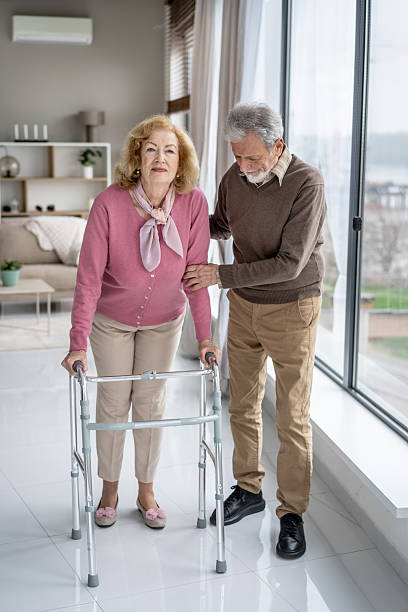 istock Seniors enjoying life: supportive couple in bright room 2243310505