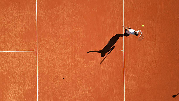 istock Tennis Player Executing Backhand Stroke on Clay Court 2 2243310769