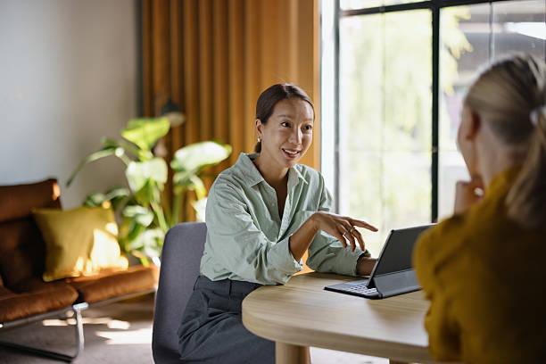 istock Businesswomen having important conversation during meeting 2243310996