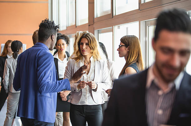 istock Diverse Business Executives Networking at Professional Conference Event 2243312568