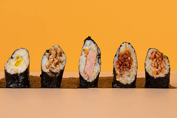 istock Assortment of Delicious Sushi Rolls with Various Fillings 2243315640