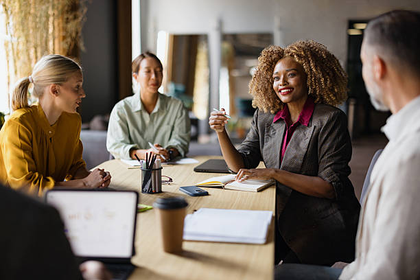 istock Diverse business team collaborating during a meeting in modern office 2243315771