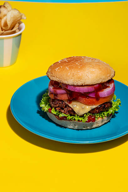 istock Gourmet Burger on Blue Plate: Minimalist Style 2243317547
