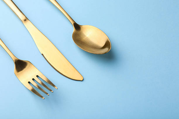 istock Stylish cutlery set on light blue table, above view. Space for text 2243324791