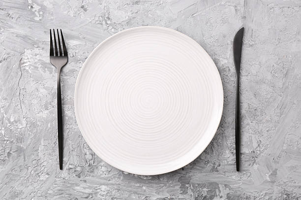istock Elegant setting with stylish cutlery on grey textured table, flat lay 2243329888
