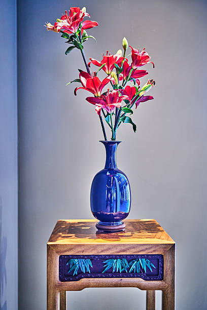 Modern interior decoration, flowers and stylish ceramic vases