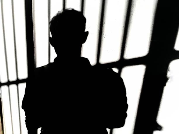 istock Silhouette of a man standing 2243340336
