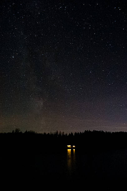 istock Starry sky and bridge silhouette at night 2243343057